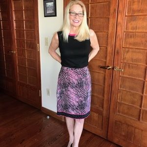 Black skirt with multi colored print.